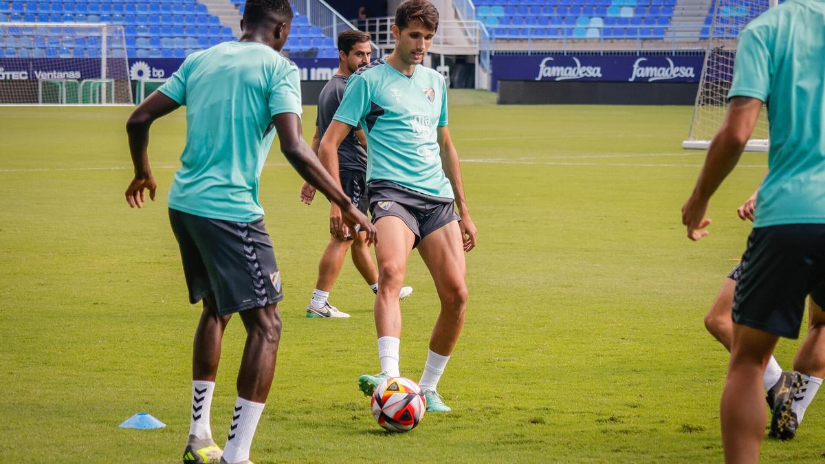 Imagen del entrenamiento de este martes en La Rosaleda.