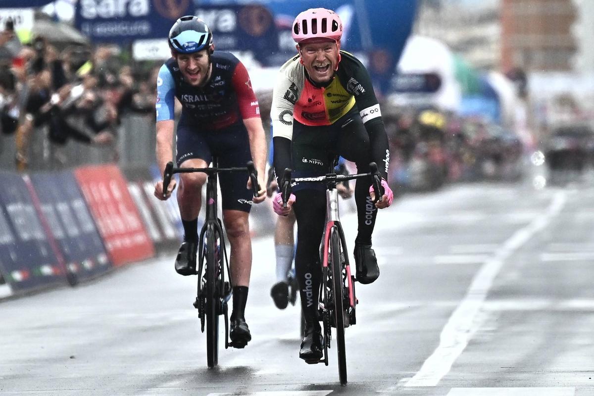 Viareggio (Italy), 16/05/2023.- Danish rider Magnus Cort Nielsen (R) of EF Education - EasyPost team reacts after crossing the finish line to win the 10th stage of the 2023 Giro d’Italia cycling race over 196 km from Scandiano to Viareggio, Italy, 16 May 2023. (Ciclismo, Italia) EFE/EPA/LUCA ZENNARO
