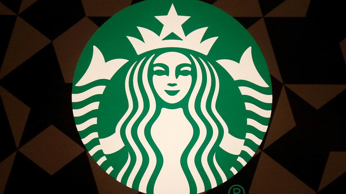 FILE PHOTO: A Starbucks logo is pictured on the door of the Green Apron Delivery Service at the Empire State Building in New York