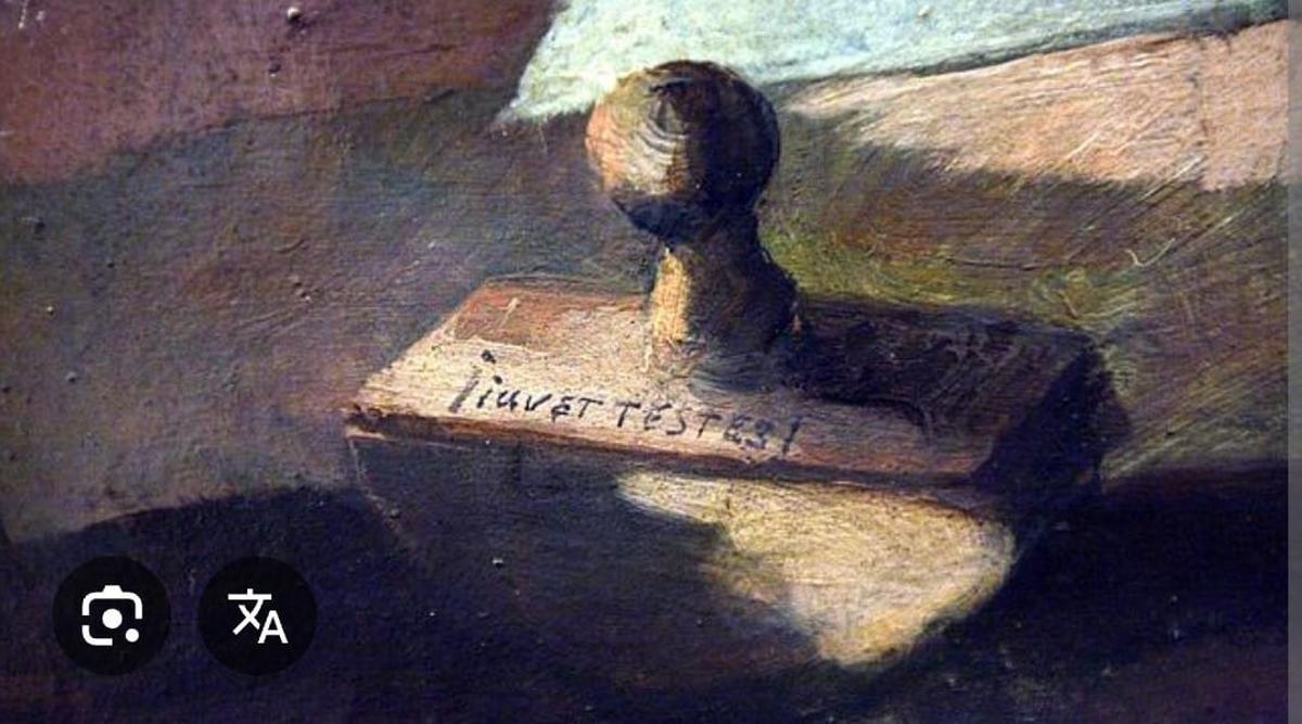 La frase "Manda huevos" en latín, en el retrato de Trillo.