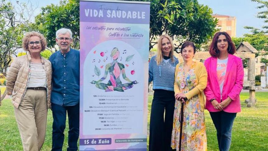 Organizadores y representantes del Concello.