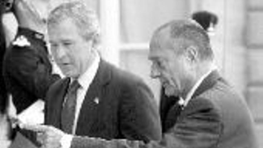 Bush y Chirac rozan el consenso en la resolución de la ONU para Irak