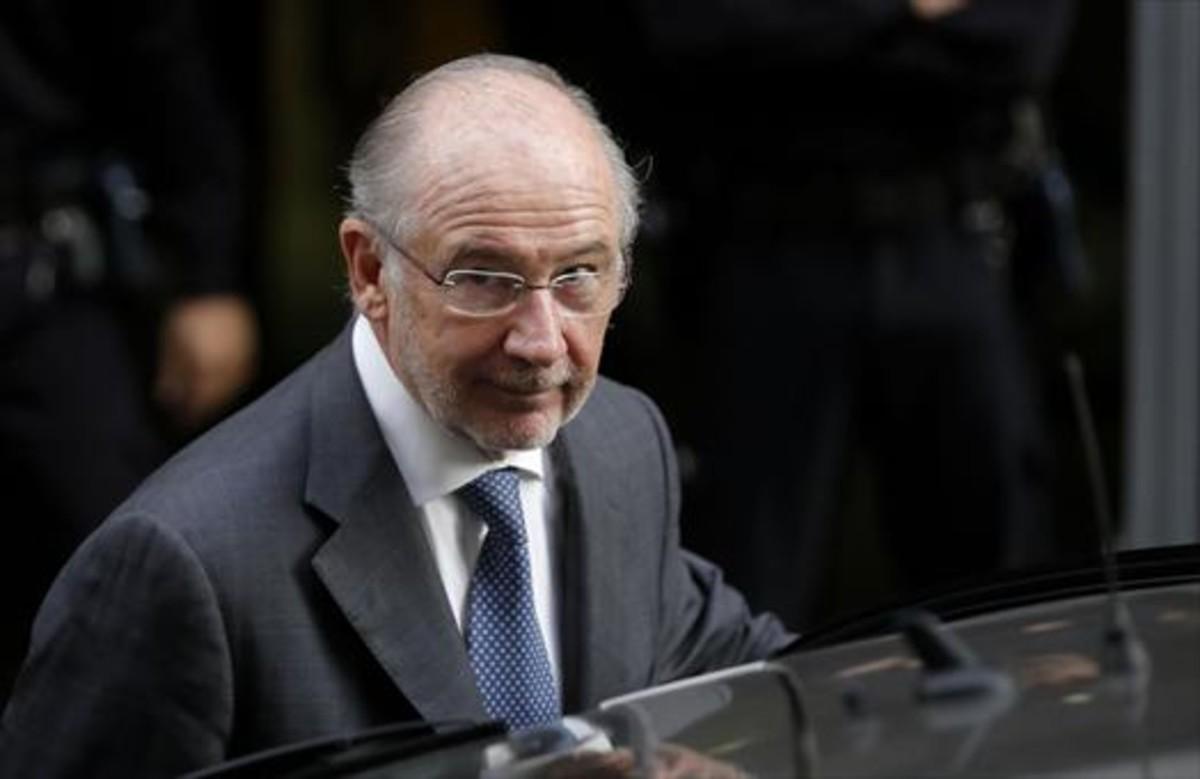 Rodrigo Rato sale de declarar en la Audiencia Nacional por el caso de las tarjetas opacas de Caja Madrid, en octubre del 2014.