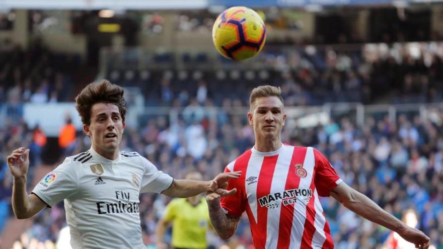 Raúl García, amb Odriozola en el partit al Santiago Bernabéu