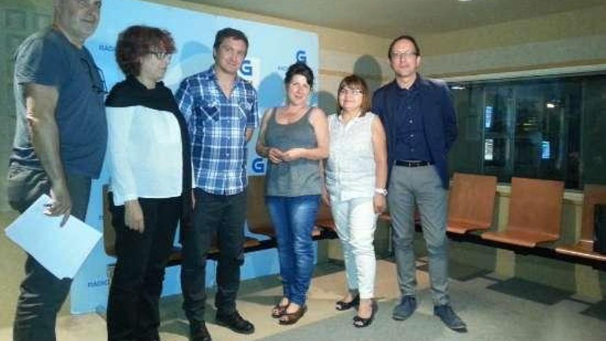 Anxo Lorenzo (1º d.), los ganadores (c.) y profesionales de RG.