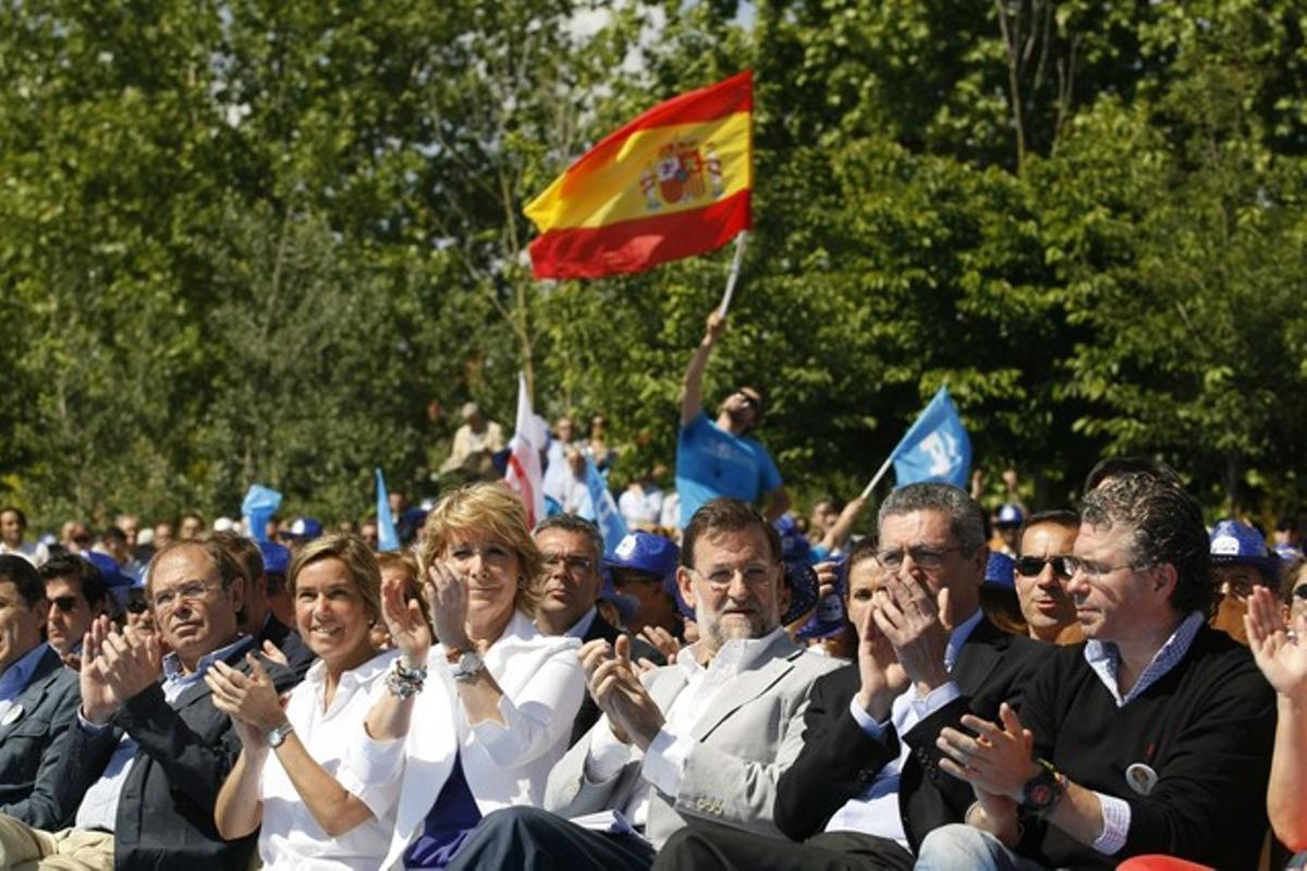 Esperanza Aguirre, Mariano Rajoy y Alberto Ruiz Gallardón, hoy en Madrid.