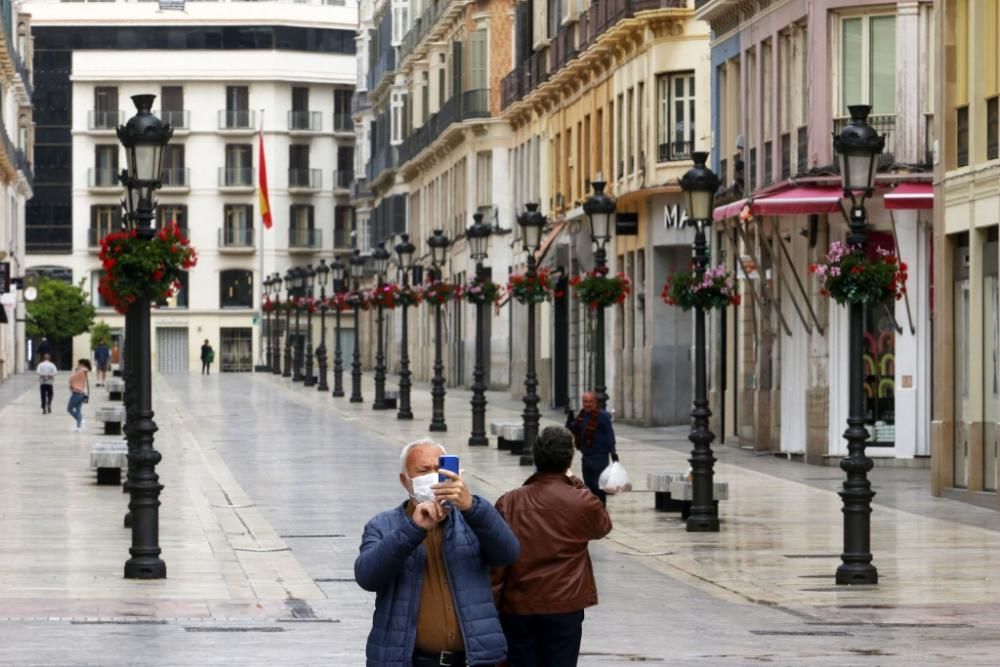 Calles vacías e inhóspitas en lo que era un Centro de Málaga bullicioso y lleno de actividad.