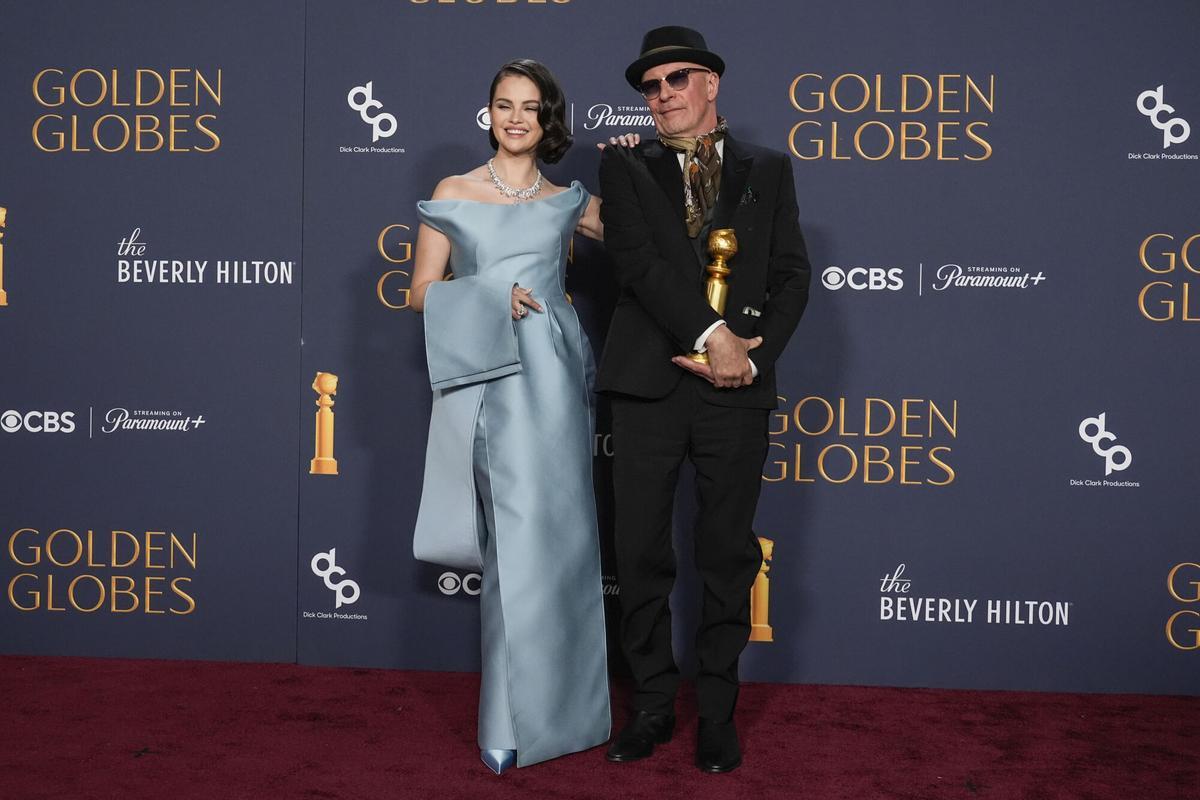 Selena Gomez, left, and Jacques Audiard pose in the press room with the award for best motion picture - musical or comedy for &quot;Emilia Perez&quot; during the 82nd Golden Globes on Sunday, Jan. 5, 2025, at the Beverly Hilton in Beverly Hills, Calif. (AP Photo/Chris Pizzello). 010525131219, 21334631