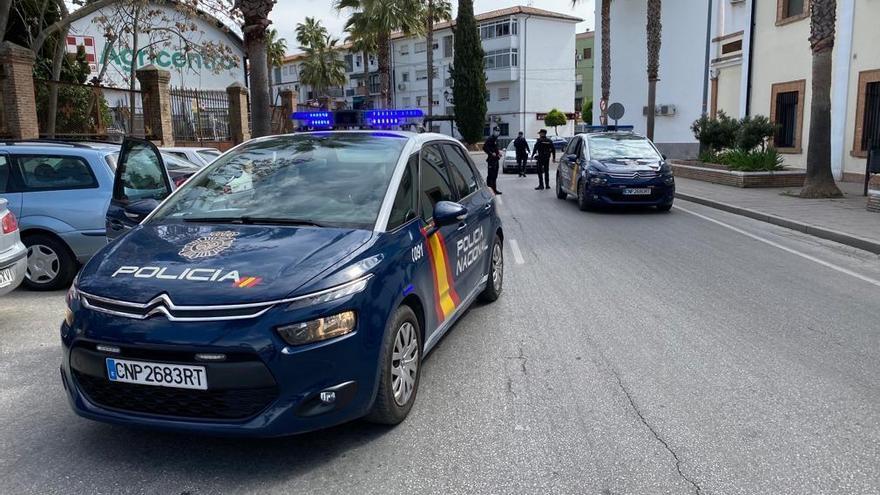 Dos vehículos de la Policía Nacional en Ronda.