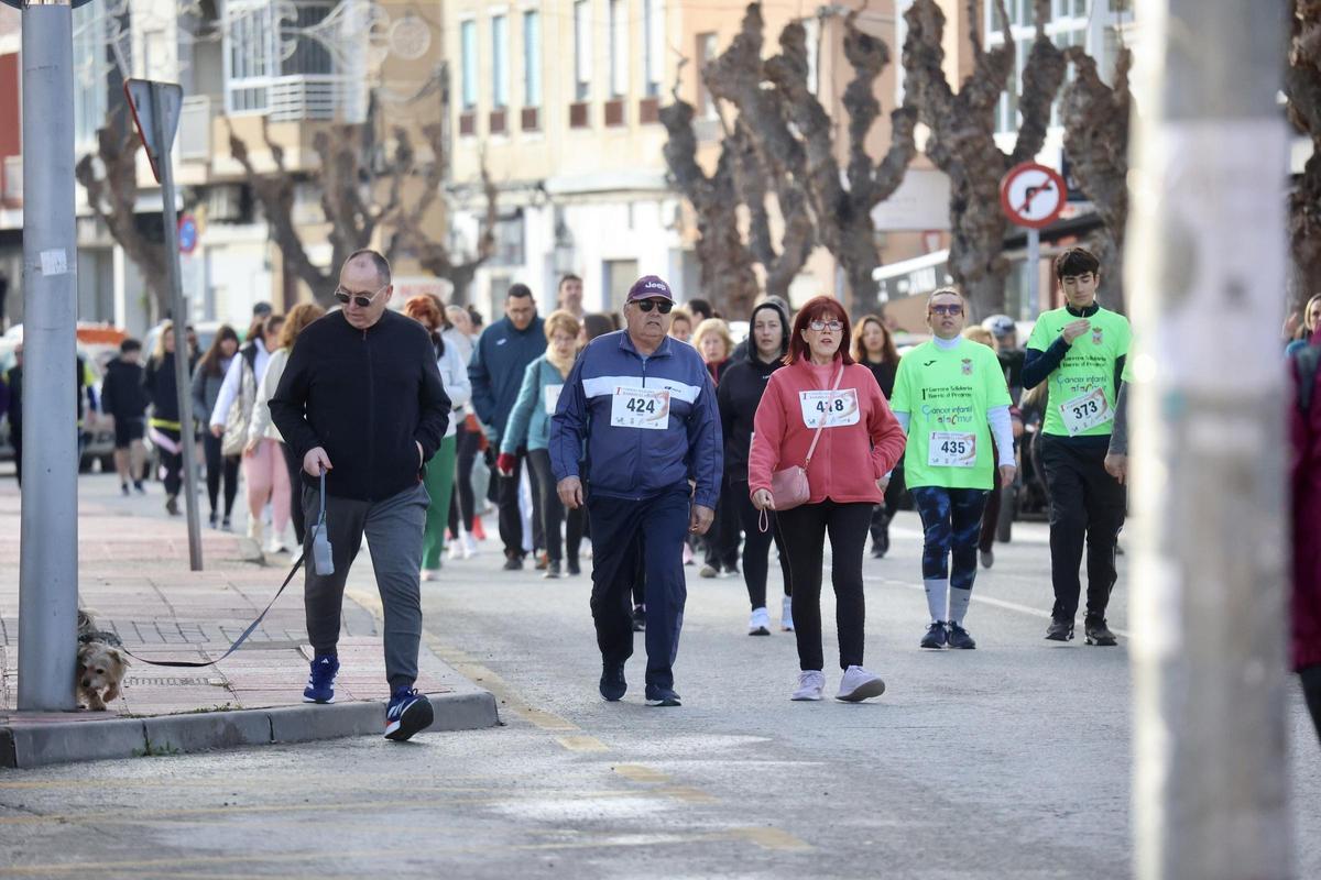 Las imágenes de la carrera popular solidaria en el barrio de El Progreso