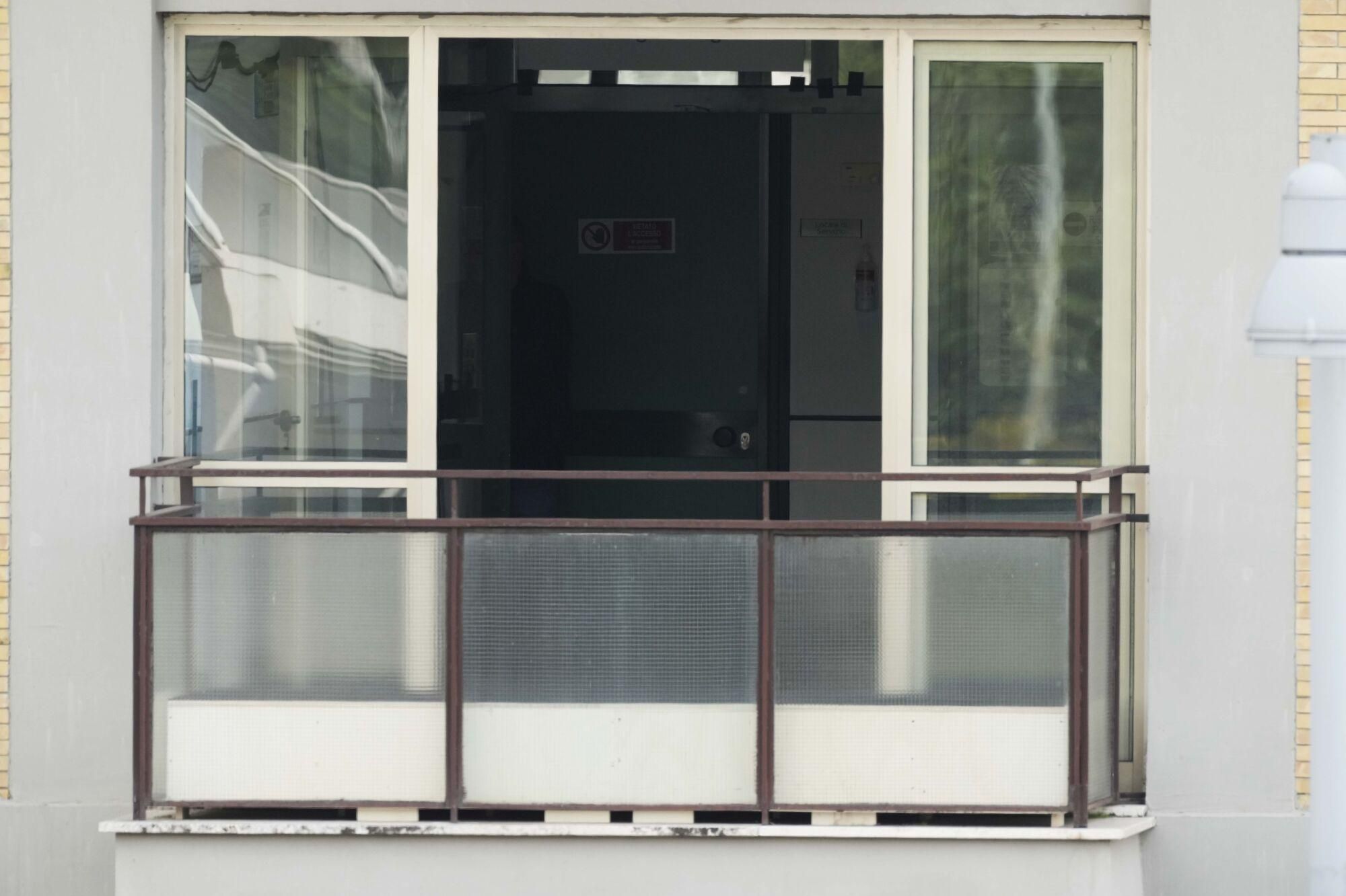 A window is open where Pope Francis will appear after the Angelus preyer at the Agostino Gemelli Polyclinic in Rome, Sunday, March 23, 2025, where he has been treated for bronchitis and bilateral pneumonia since Feb. 14. (AP Photo/Andrew Medichini). EDITORIAL USE ONLY/ONLY ITALY AND SPAIN