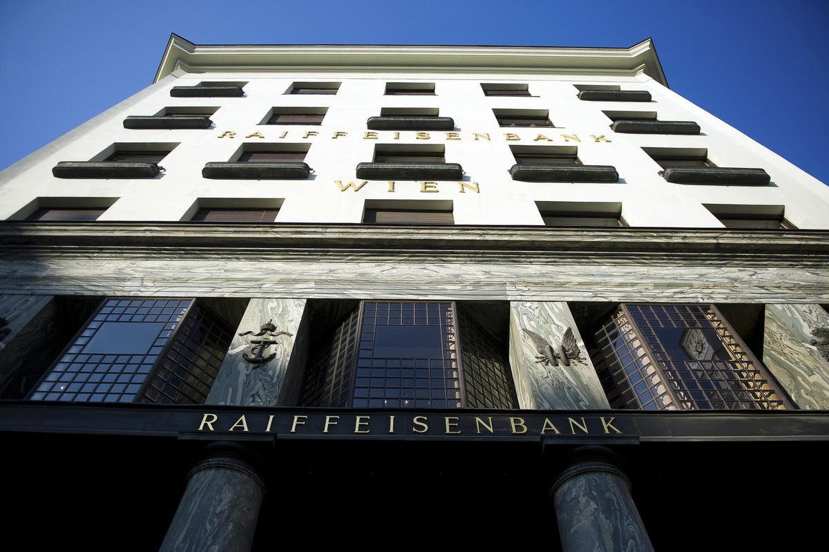 A branch of Raiffeisen Bank International AG is seen in Vienna, Austria, on Tuesday, March 6, 2012. Austria sees no need to change its debt issuance program and is sticking to its plan to stay below the European Union's deficit ceiling this year even as it injects cash into Oesterreichische Volksbanken AG and KA Finanz. Photographer: Akos Stiller/Bloomberg
