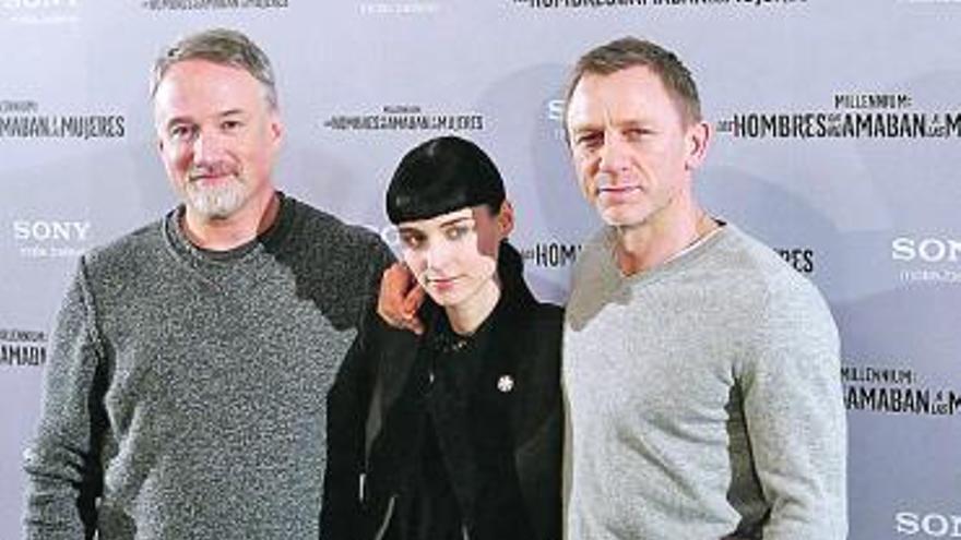 En las fotos, Craig, Mara y Fincher. / efe