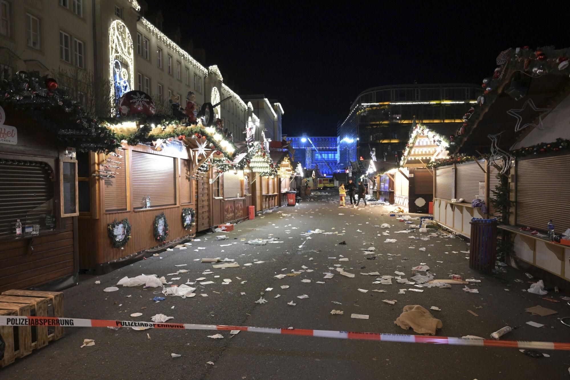 A view of the cordoned-off Christmas market after an incident in Magdeburg, Germany, Friday Dec. 20, 2024. (Heiko Rebsch/dpa via AP) Associated Press / LaPresse Only italy and Spain. EDITORIAL USE ONLY/ONLY ITALY AND SPAIN