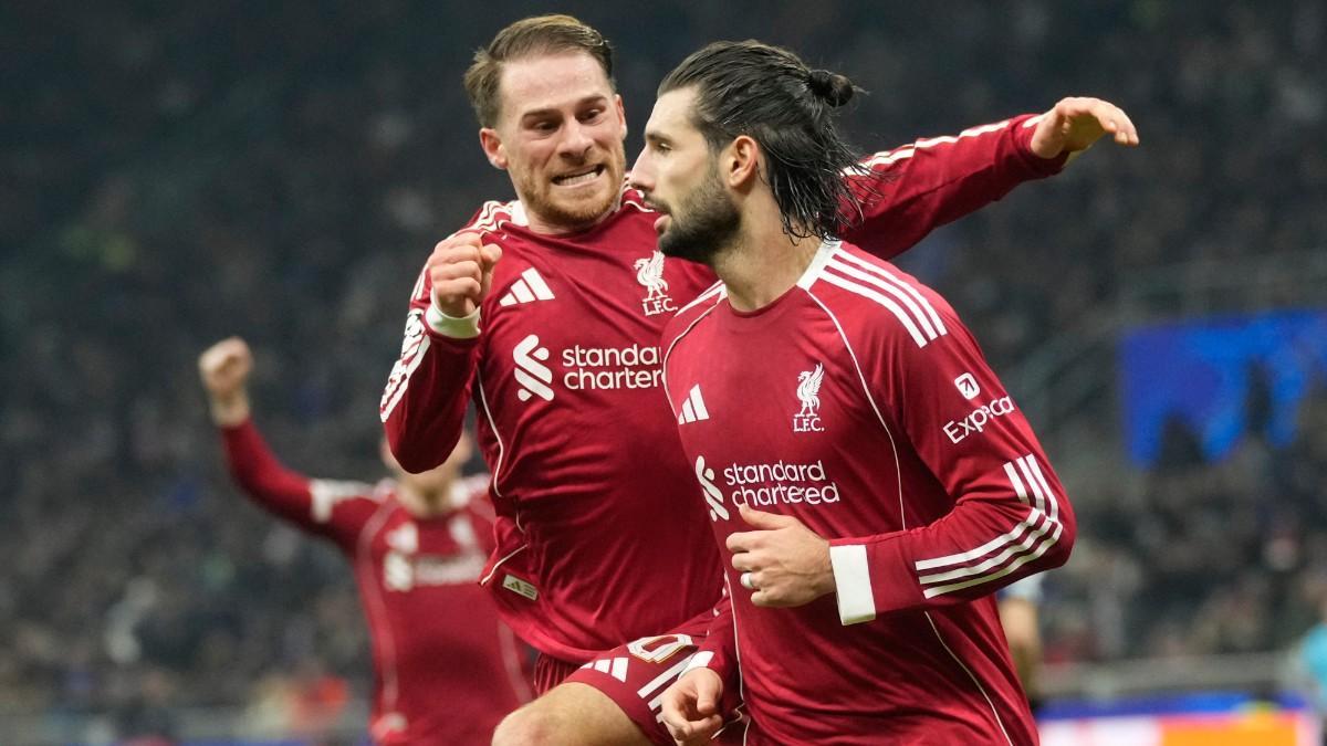Liverpool's Dominik Szoboszlai celebrates after scoring his side's first goal from a penalty shot during a Champions League, league phase, soccer match between Inter Milan and Liverpool in Milan, Italy, Tuesday, Dec.9, 2025. (AP Photo/Luca Bruno)