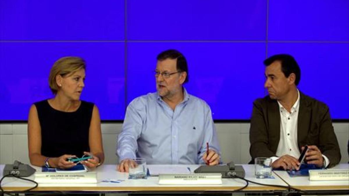Cospedal, Rajoy y Martínez-Maillo, ayer en el comité ejecutivo nacional del PP.