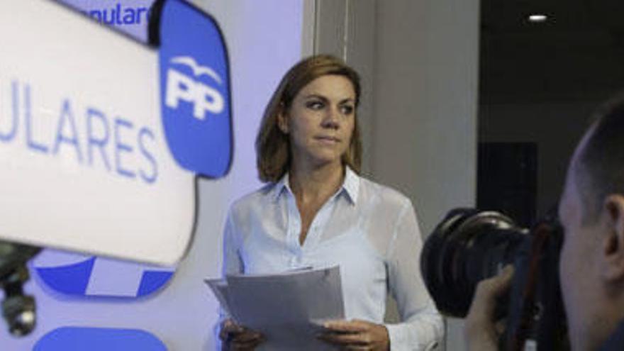 La secretaria general del PP, María Dolores de Cospedal, a su llegada a la rueda de prensa