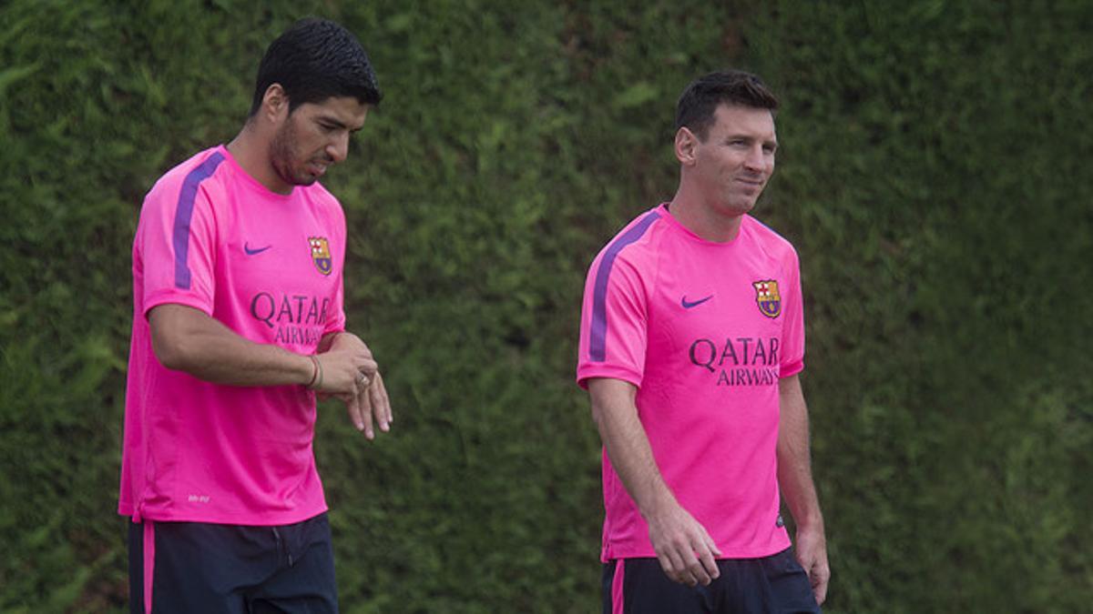 Luis Suárez y Leo Messi, durante un entrenamiento en la ciudad deportiva del Barça