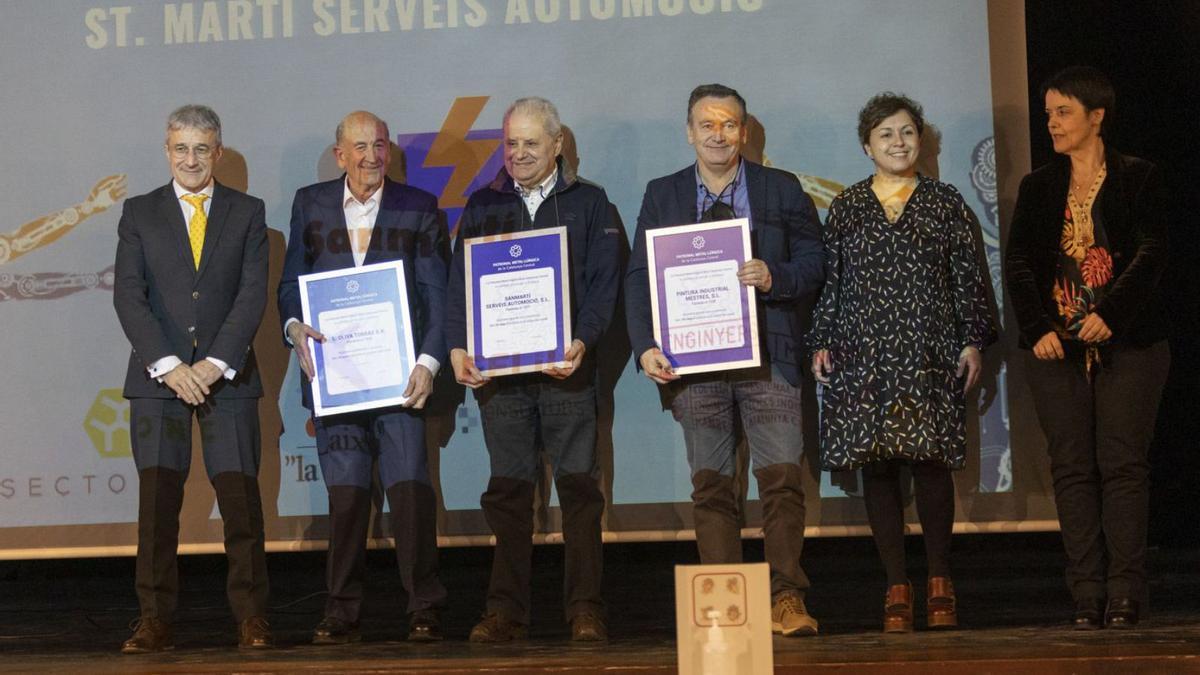 Els representants de les empreses guardonades, amb el president i les vicepresidentes de la patronal | MONTSE SOLER