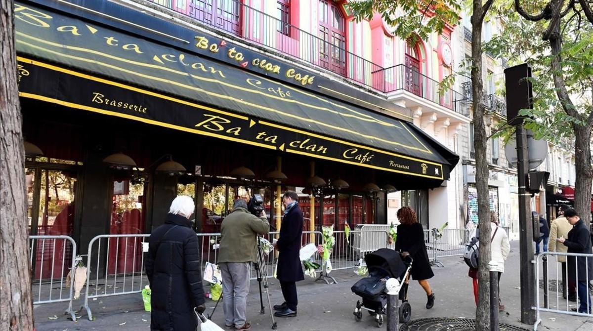 undefined36245012 people walk in front of the bataclan concert hall in paris o161111202428