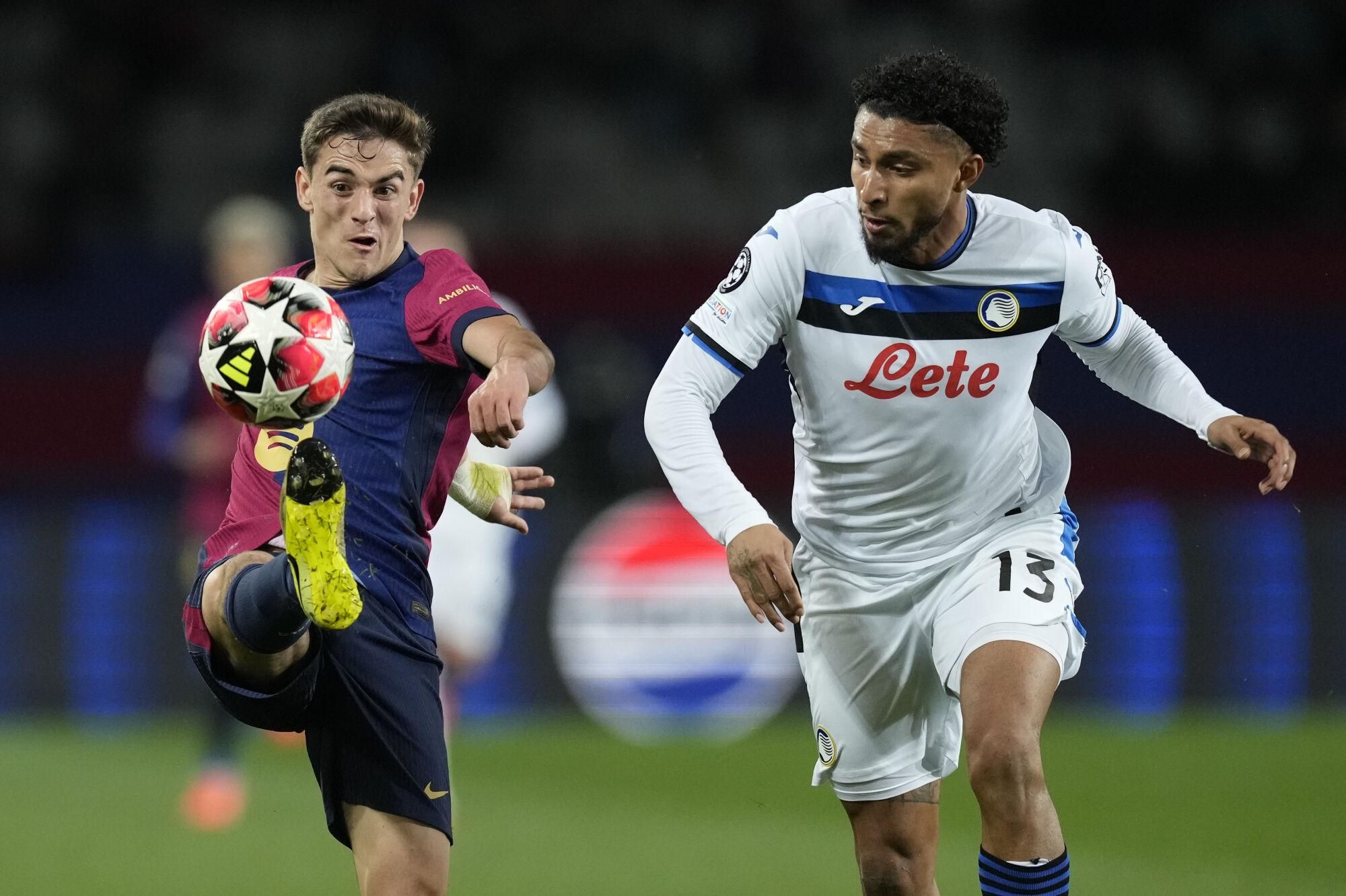 FC Barcelona's Gavi (L) in action against Atalanta's Ederson dos Santos (R) during the UEFA Champions League soccer match between FC Barcelona and Atalanta BC, in Barcelona, Spain, 29 January 2025. EFE/ Enric Fontcuberta