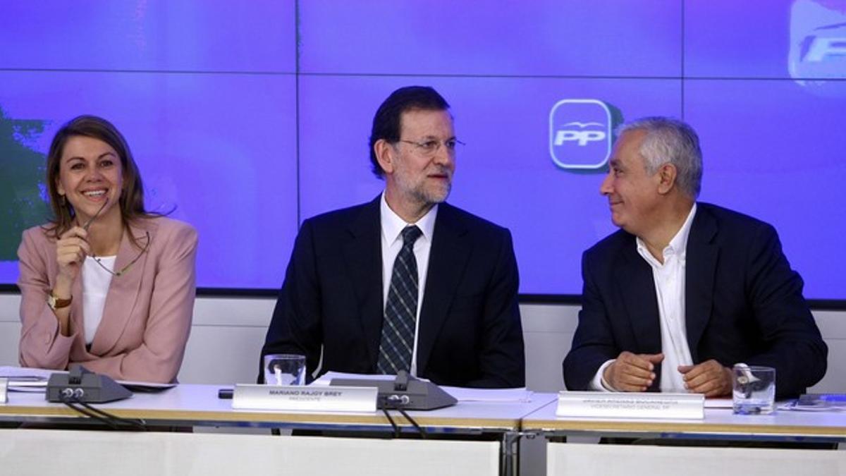 Rajoy junto a Cospedal y Arenas