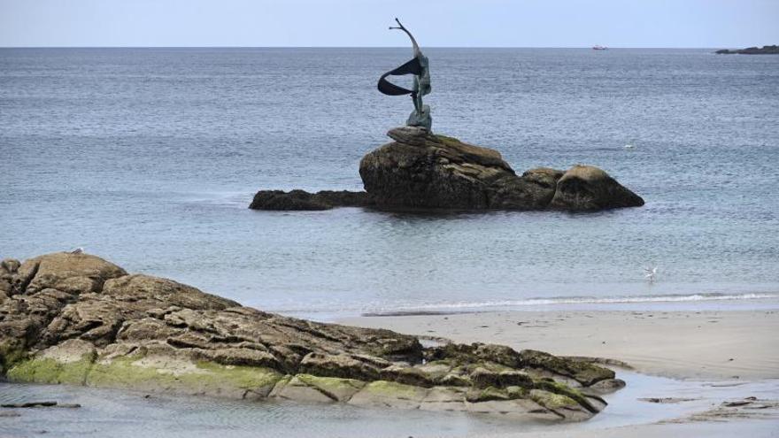 Playa de Silgar, ayer, con la característica “Madama”. |   // RAFA VÁZQUEZ