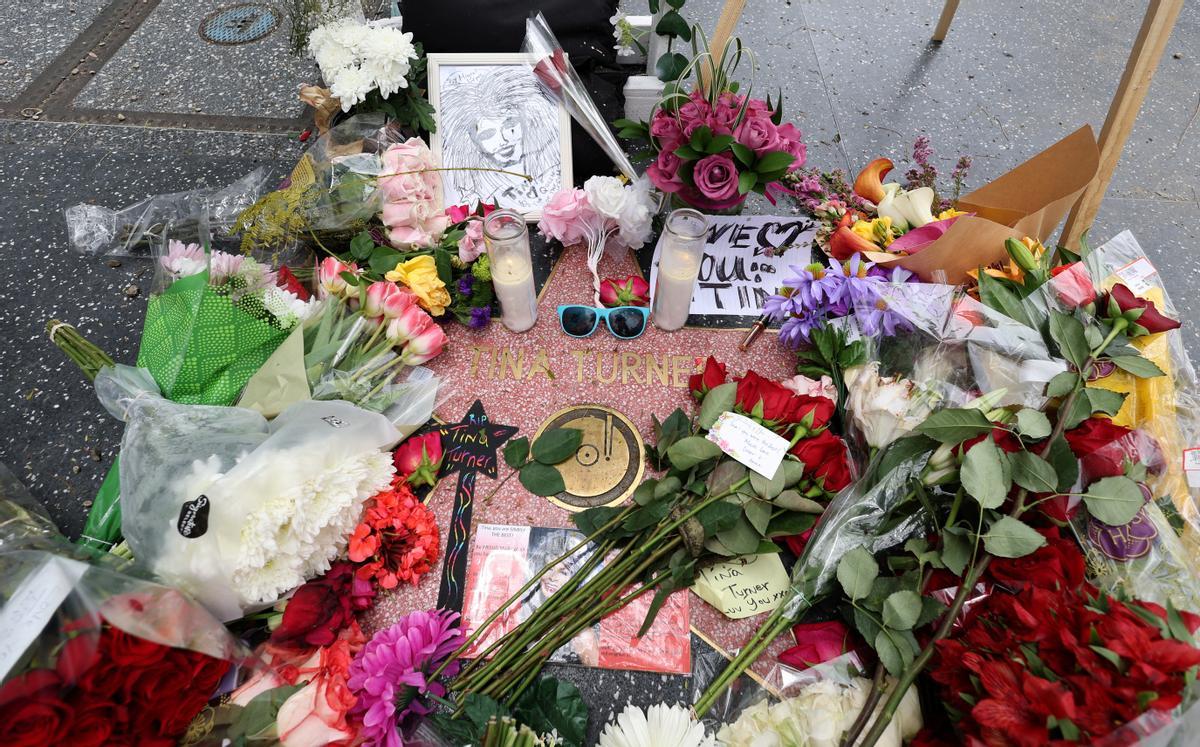 The star of late singer Tina Turner is adorned with flowers on the Hollywood Walk of Fame in Los Angeles