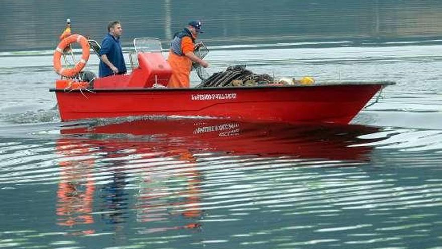 Pesca de anguila en el río Ulla. // Noé Parga