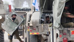 Israeli forces move along the central Gaza border