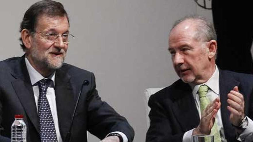 Rajoy y Rato, en un acto.