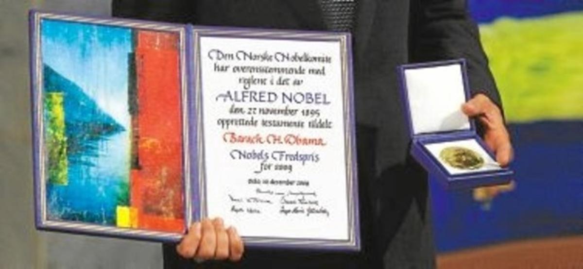 US President Barack Obama holds his Noble Peace Prize during the Nobel Peace Prize Ceremony at the Oslo City Hall in Oslo on December 10, 2009. The president faces a tricky task of reconciling the revered honor with his decision just last week to send 30,000 troops to escalate the war in Afghanistan, a move which tripled the US force there since he took office. AFP PHOTO / Jewel SAMAD US President Barack Obama holds his Noble Peace Prize during the Nobel Peace Prize Ceremony at the Oslo City Hall in Oslo on December 10, 2009. The president faces a tricky task of reconciling the revered honor with his decision just last week to send 30,000 troops to escalate the war in Afghanistan, a move which tripled the US force there since he took office. AFP PHOTO / Jewel SAMAD