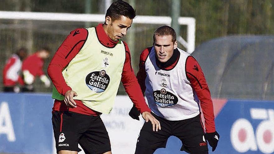 David Simón y Álex Bergantiños, durante un entrenamiento en Abegondo.