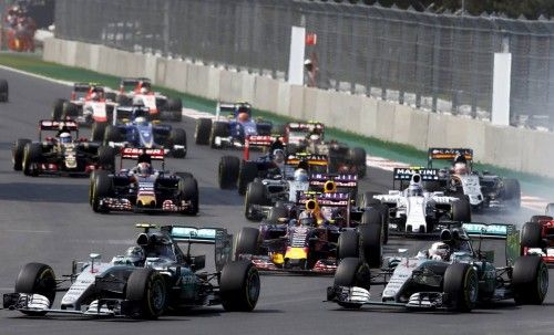 Mercedes Formula One drivers Nico Rosberg of Germany and Lewis Hamilton of Britain lead the pack during the start of the Mexican F1 Grand Prix at Autodromo Hermanos Rodriguez in Mexico City