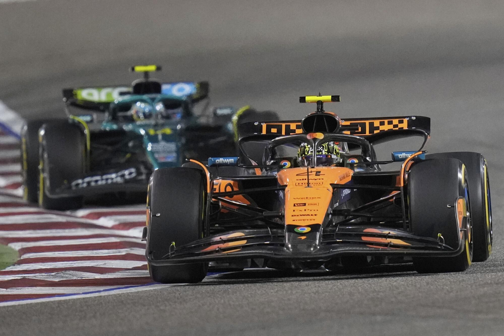 McLaren driver Lando Norris of Britain in action during the the Formula One Bahrain Grand Prix, in Sakhir, Sunday, April 13, 2025. (AP Photo/Darko Bandic). EDITORIAL USE ONLY / ONLY ITALY AND SPAIN