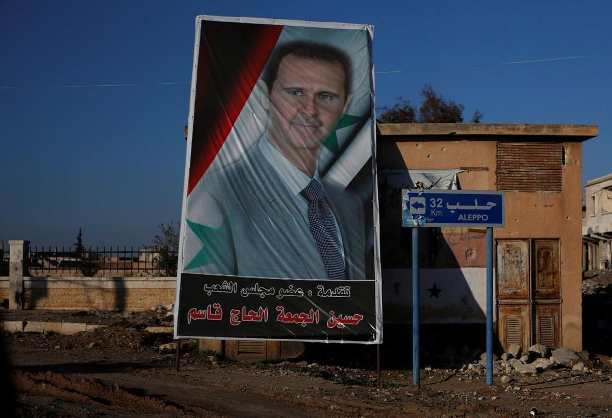 A picture of Syria’s President Bashar al-Assad is seen in Ramouseh, a government controlled area of Aleppo, Syria December 8, 2016. REUTERS/Omar Sanadiki     TPX IMAGES OF THE DAY