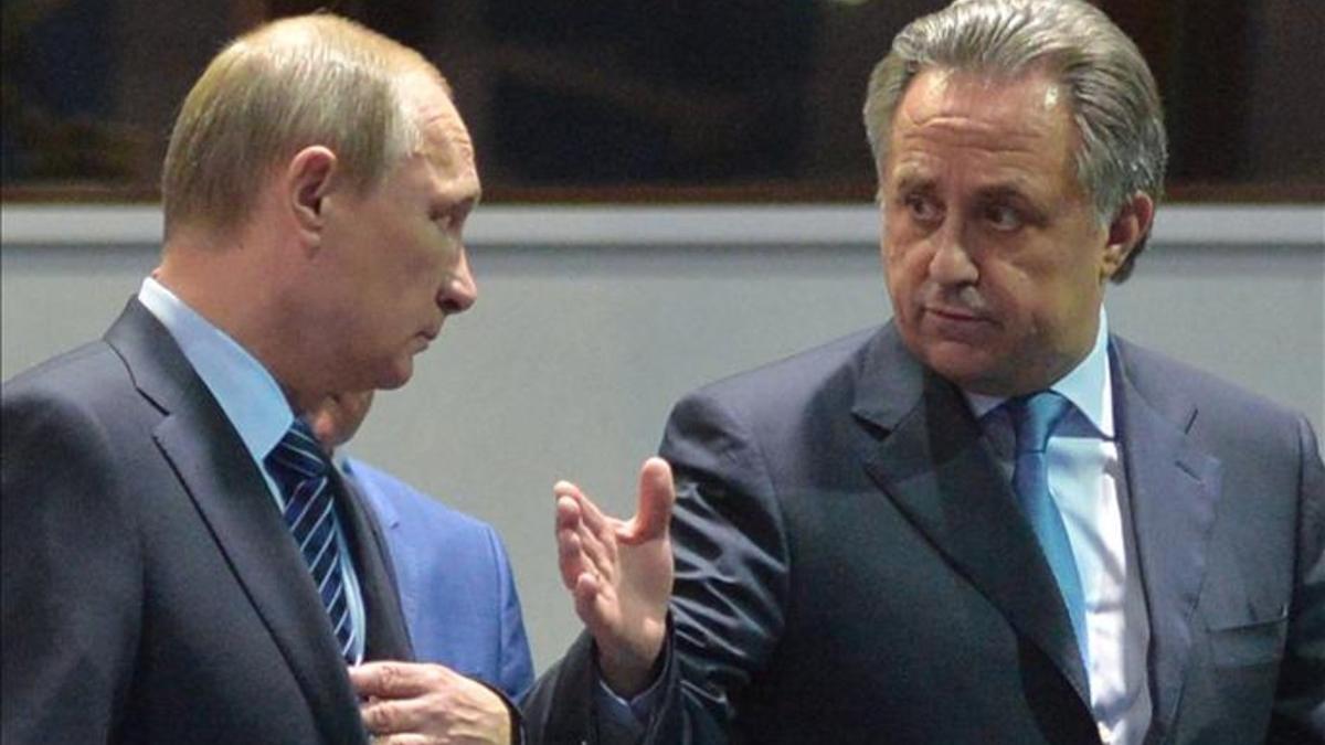 Vladimir Putin junto al ministro de Deportes Vitaly Mutko