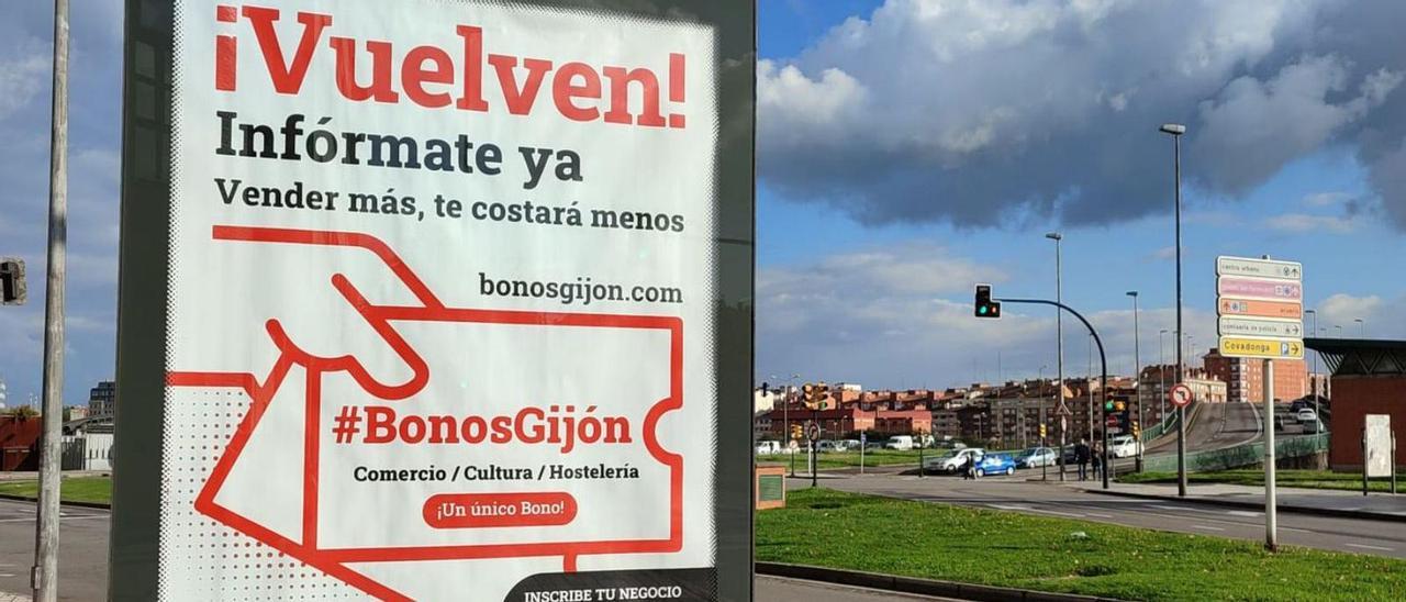 Un cartel animando a los negocios locales a participar en el programa «Bonos Gijón».