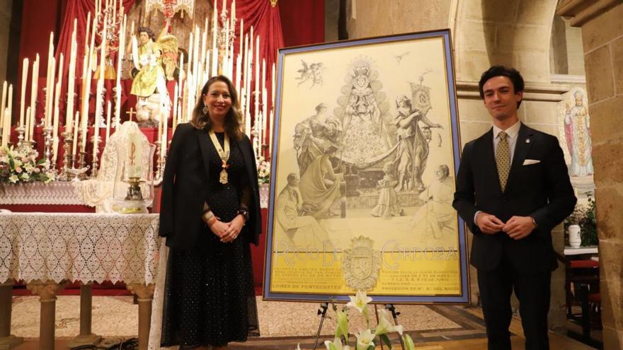 Guadalupe Grande, hermana mayor del Rocío, y Raúl Muñoz, autor del cartel.
