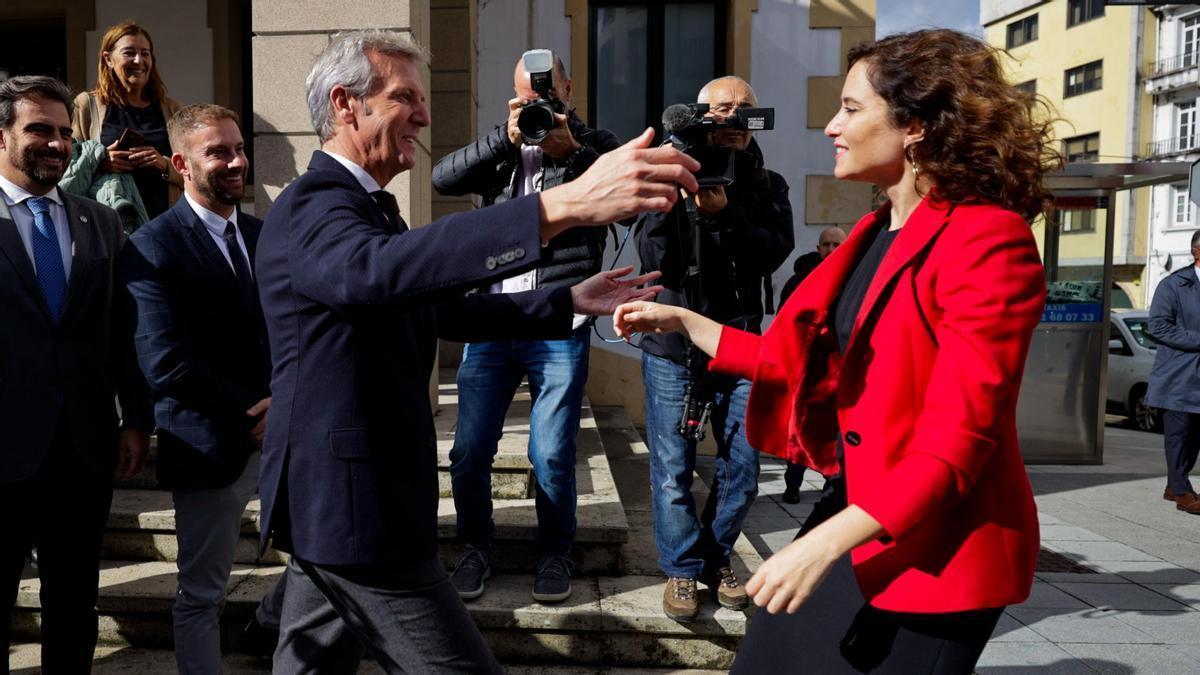 El presidente gallego, Alfonso Rueda, e Isabel Díaz Ayuso.