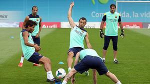 Els jugadors blaugrana, durant la sessió per preparar el partit contra el Bayern.