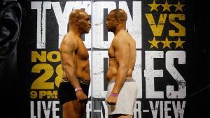 Nov 27, 2020; Los Angeles, CA, USA; Mike Tyson and Roy Jones, Jr. face off during weigh ins for a heavyweight exhibition boxing bout for the WBC Frontline Belt in Los Angeles.  Mandatory Credit: Lynn Millspaugh/Handout Photo via USA TODAY Sports     TPX IMAGES OF THE DAY