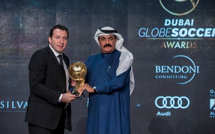 Belgium's soccer team coach Marc Wilmots receives "Best Coach of the Year" award during the Globe Soccer Awards Ceremony at Dubai International Sports Conference, in Dubai
