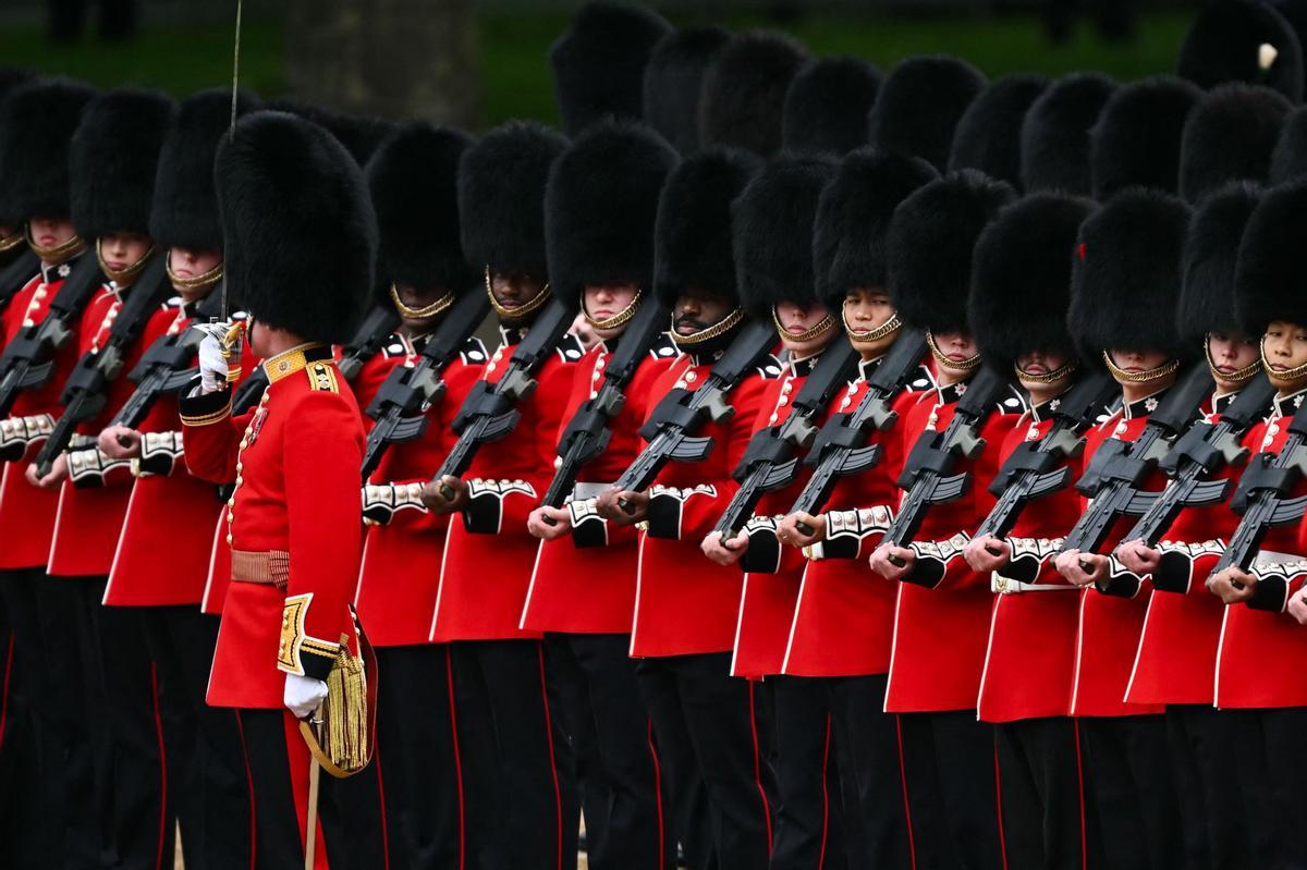 Members of the Scots Guards perform on Horse Guards Parade for the Kings Birthday Parade, Trooping the Colour, in London on June 15, 2024. The ceremony of Trooping the Colour is believed to have first been performed during the reign of King Charles II. Since 1748, the Trooping of the Colour has marked the official birthday of the British Sovereign. Over 1500 parading soldiers and almost 300 horses take part in the event. (Photo by JUSTIN TALLIS / AFP)