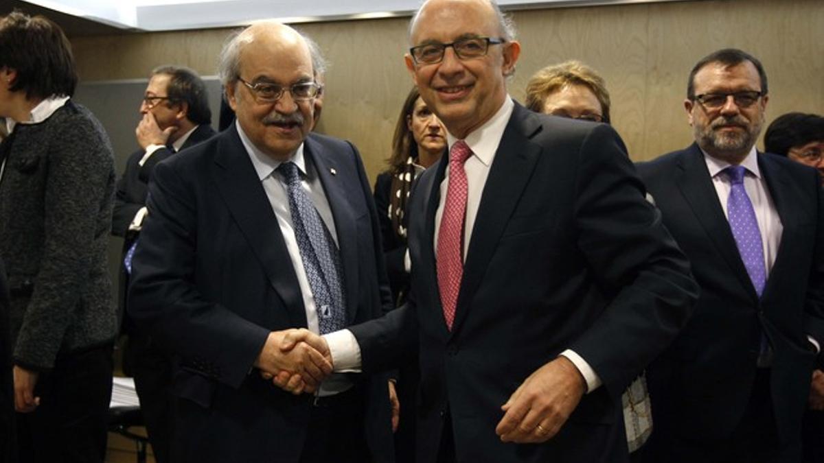 El 'conseller' de Economia de la Generalitat, Andreu Mas-Colell, con el Ministro de Hacienda, Cristobal Montoro