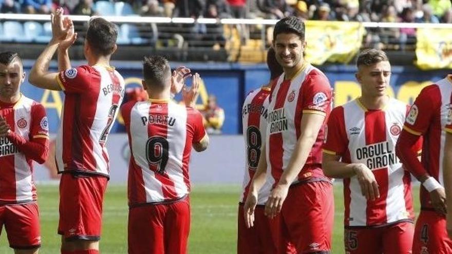 Los jugadores del Girona celebran su victoria.