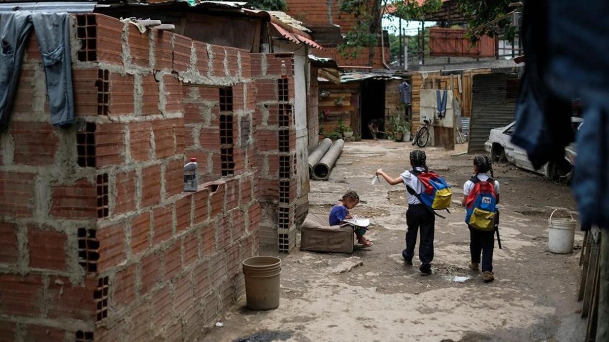 Unos niños en el barrio de Petare, en Caracas.