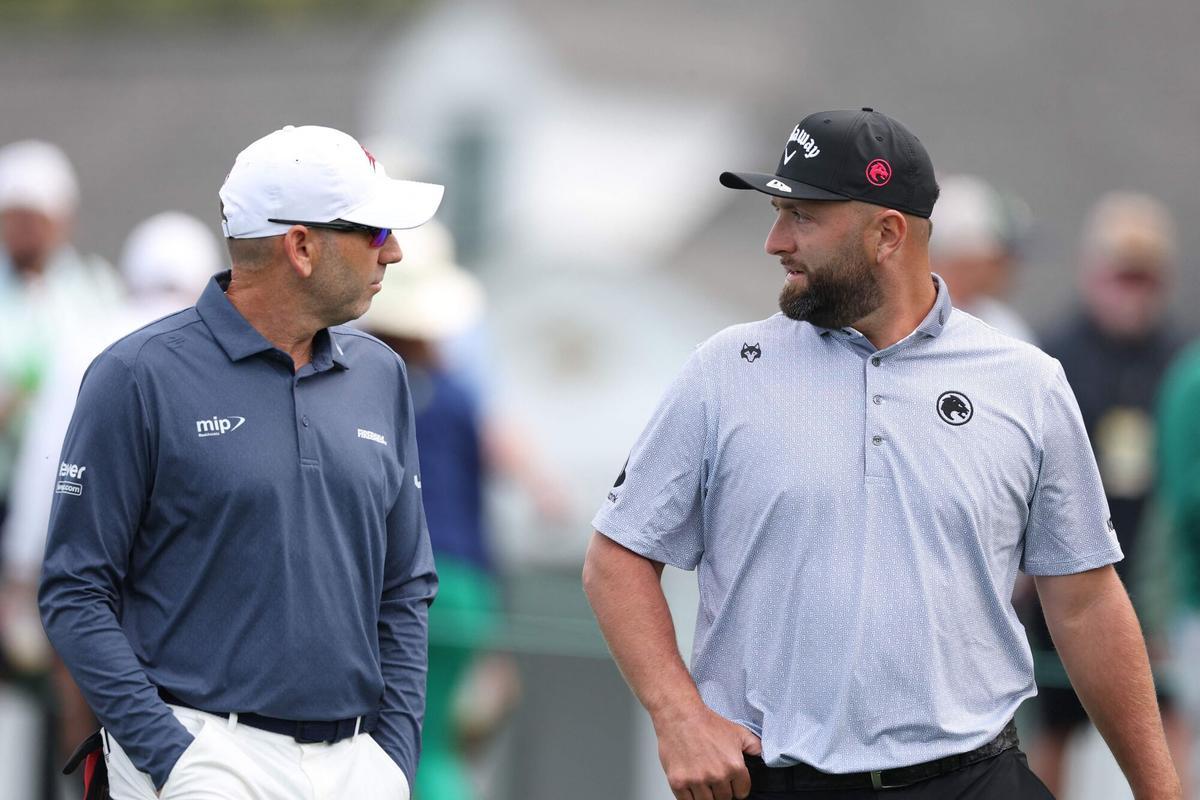 AUGUSTA, GEORGIA - APRIL 07: Sergio Garcia of Spain talks with Jon Rahm of Spain as they play the 10th hole during a practice round prior to the 2026 Masters Tournament at Augusta National Golf Club on April 07, 2026 in Augusta, Georgia. Andrew Redington/Getty Images/AFP (Photo by Andrew Redington / GETTY IMAGES NORTH AMERICA / Getty Images via AFP)