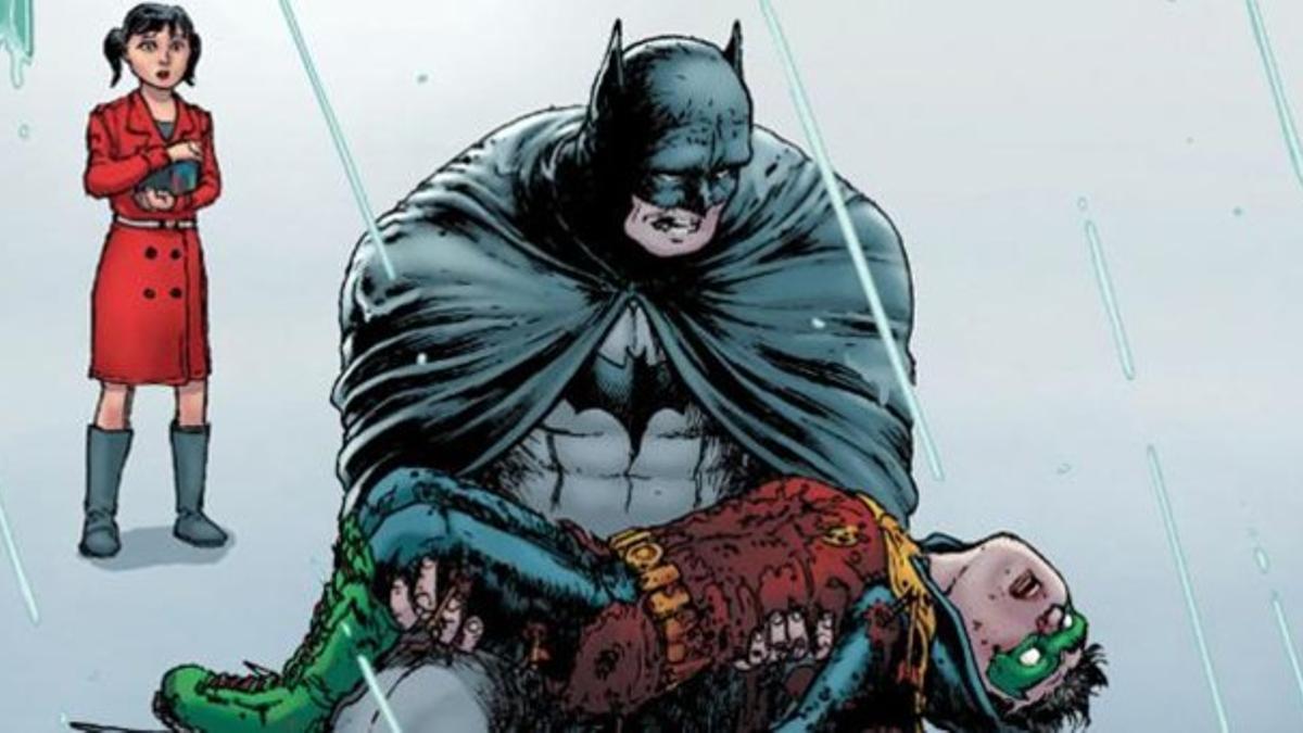 Batman recoge a Robin tras su muerte.