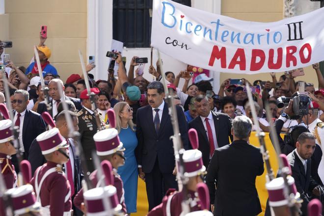 Venezuelan President Nicolas Maduro and his wife Cilia Flores arrive at the National Assembly for his swear-in ceremony for a third term in Caracas, Venezuela, Friday, Jan. 10, 2025. (AP Photo/Matias Delacroix) Associated Press / LaPresse Only italy and Spain. EDITORIAL USE ONLY/ONLY ITALY AND SPAIN